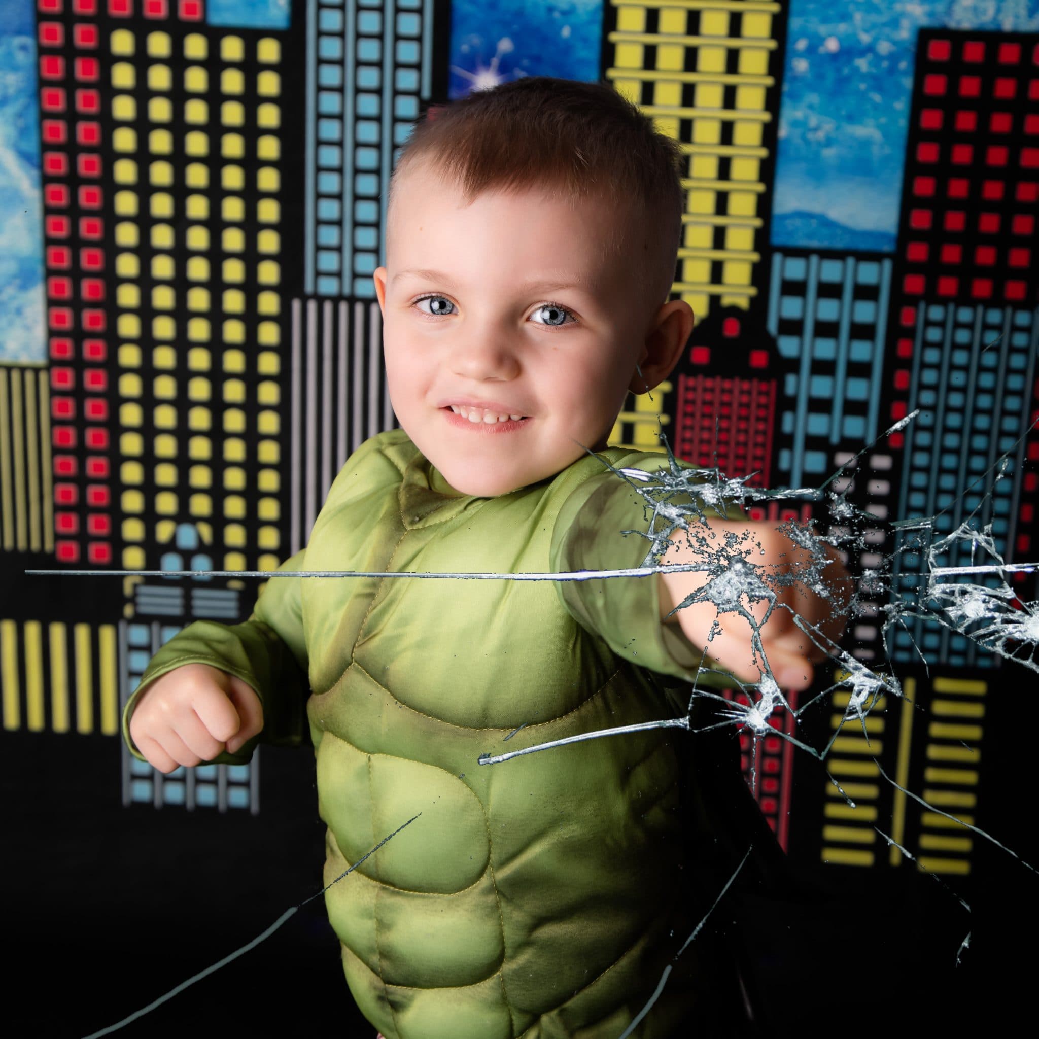 Confident superhero portrait for children.